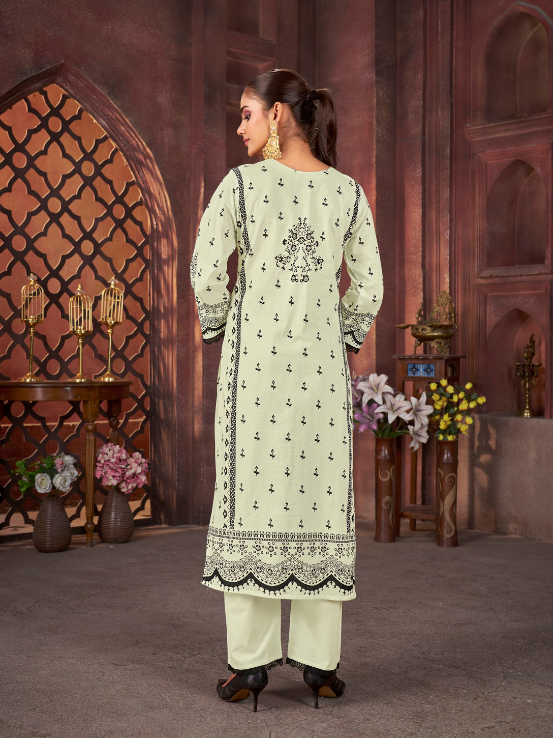 Graceful Pistachio Green Printed Cotton Suit with Multicolor Dupatta