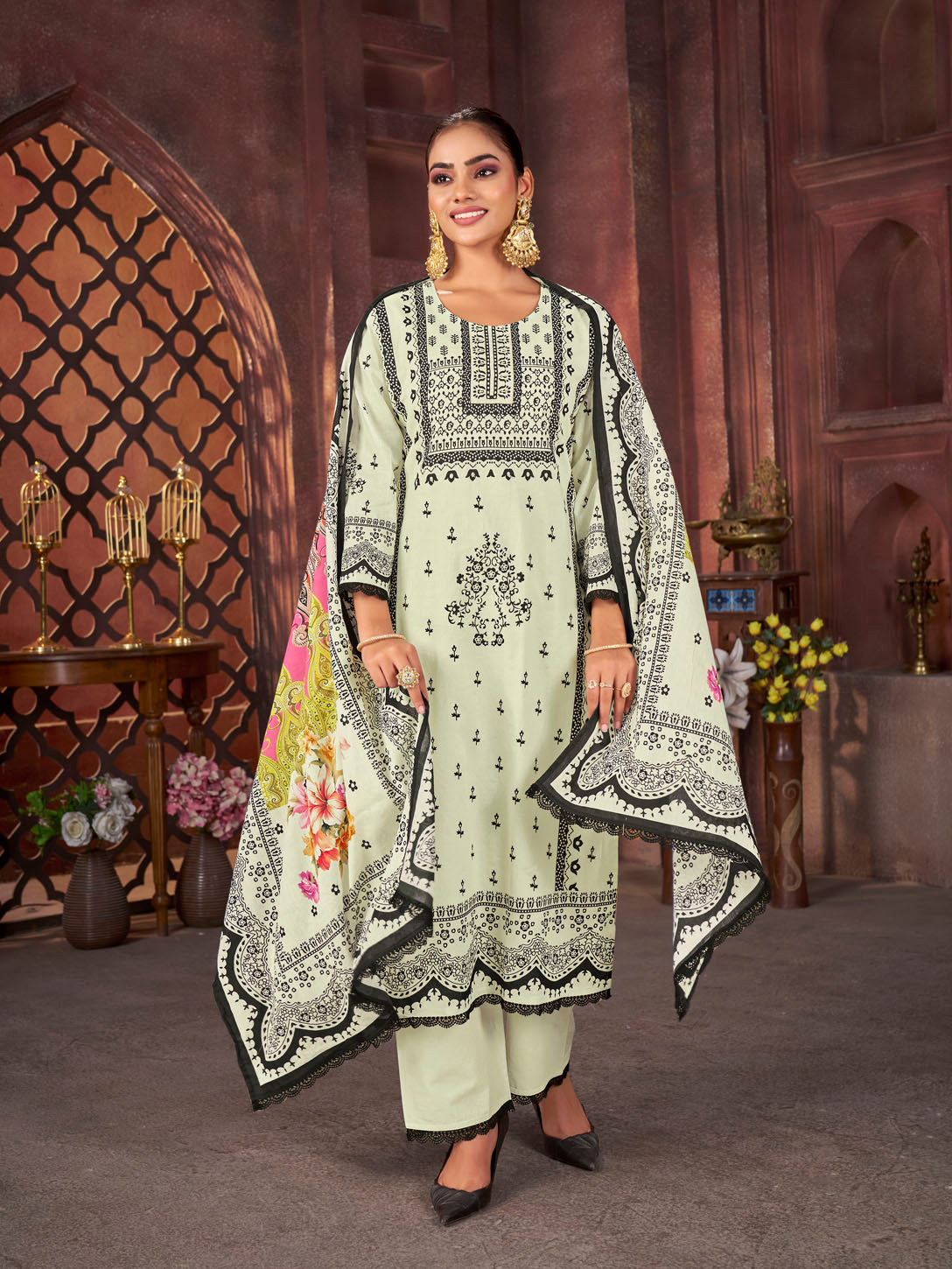 Graceful Pistachio Green Printed Cotton Suit with Multicolor Dupatta