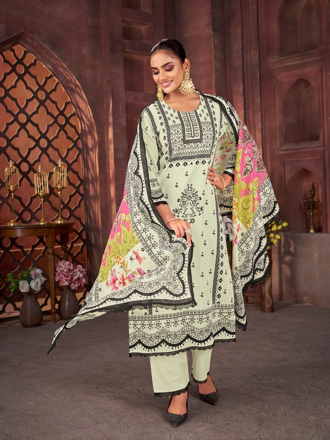 Graceful Pistachio Green Printed Cotton Suit with Multicolor Dupatta