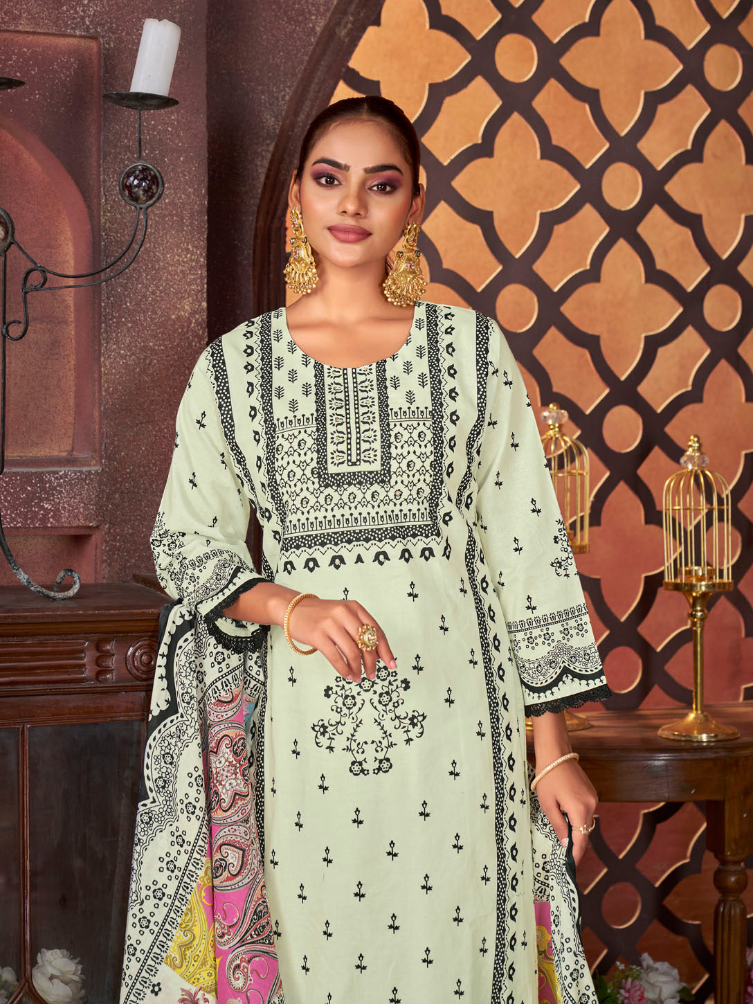 Graceful Pistachio Green Printed Cotton Suit with Multicolor Dupatta